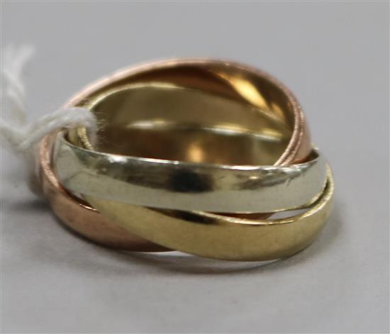 A 9ct three colour gold triple Russian wedding ring, size E.